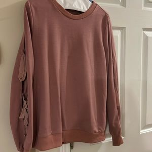 Super cute long sleeve top with open sleeves with ties! Great condition!